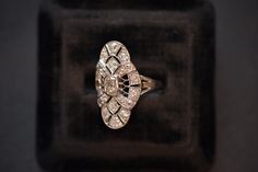 Sensational antique diamond dinner/cocktail/statement ring crafted in platinum, ready to show up and show off all night long.PlatinumSize 6.25/6.5 (resizable)5.1gEst. 1.5ctw of mixed old cut diamonds, including a very cushiony elongated OMC in the center.Measures 1 1/2 in. longWant to see more photos or videos? Have questions about resizing or layaway? Find me on Instagram @lunamerchant and send me a DM. Ring Crafts, Antique Diamond, Pitcairn Islands, Papua New Guinea, Guinea Bissau, Indian Ocean, Show Up, Mozambique, Statement Ring