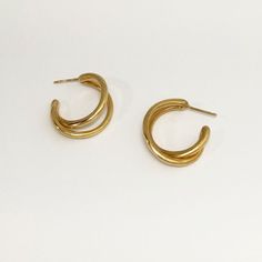 Designer Notes + This hand made unisex double hoop is like a you're wearing a multiple hoop but no extra piercing required. A beautiful classic piece for everyday and anywhere. DETAILS + Material: Gold: 18K yellow gold plated brass, a thick layer electroplating for durability. Silver: high polished sterling silver. Earring Posts: 18K gold plated sterling silver posts. Measurements: 7/8" in length (2.3cm) 1" in width (2.5cm) Handcrafted by artisans in New York City. • Care: Keep airtight to maint Double Hoop Earrings, Earring Posts, Silver Earring, Luxury Women, Silver Hoop Earrings, Gold Plated Sterling Silver, Gold Vermeil, Post Earrings, Women's Jewelry