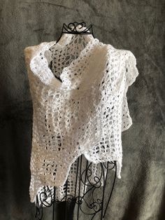 A wonderful square scalloped shawl in the lightest of yarns.  Perfect for a summer evening or as a cover up for a wedding!  Yarn:  Yarn Bee Spinesse in white Pattern:  One Step at a Time from A Crocheted Prayer Shawl Companion White Bohemian Shawl For The Beach, Summer Lace Shawl, White Bohemian Shawl For Beach, White Shawl For Spring, One-size White Shawl For Summer, One Size White Wrap, White One-size Wrap, White One Size Wrap, White Crochet Shawl For The Beach