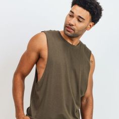 No Fuss, No Muss. This Essential Cut-Off Shirt Is Perfect To Show Off Those Muscles. Crafted Using Cotton-Blend Fabric, It Ensures Breathability During Your Most Rigorous Activities. Our Male Model Is 6' And Wears Sample Size S. 50% Cotton, 50% Modal. Jersey. Green Cotton Muscle Tee For Summer, Casual Summer Workout Shirt, Basic Khaki Summer Tops, Basic Khaki Tops For Summer, Green Relaxed Fit Sleeveless Top, Green Sleeveless Top With Relaxed Fit, Green Sleeveless Relaxed Fit Top, Green Relaxed Fit Tank Top For Everyday, Casual Khaki Cotton Tank Top