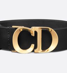 The C'est Dior belt is both a modern and elegant creation. Crafted in black smooth calfskin, it is embellished with a CD buckle in a shiny gold-finish metal inspired by House archives. The timeless accessory will lend a couture touch to jeans, a skirt or a dress.. 90 Dior Belt, Dior Star, Icon Shoes, Dior Book Tote, Short Denim, Star Shoes, Wallet Pouch, Backpack Tote Bag, Timeless Accessories