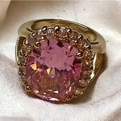 Jacqueline Kennedy Vintage Pink Kunzite & Diamonds Ring - Size 6 Signature Jacqueline Bouvier Kennedy Carefully Crafted By Camrose & Cross Gorgeous 24k Gold Plated On 925 Sterling Silver. Center Pink Simulated Kunzite Stone That Measures Approximately 12mm X 16 Mm. It Is Accented With 20 Round Simulated Diamonds. Stunning. Tarnish Free. Never Worn. Elegant Pink Gold Rings With Accent Stones, Pink Gold Jewelry With Center Stone For Formal Occasions, Formal Pink Gold Jewelry With Center Stone, Dazzling Pink Gemstone Jewelry, Elegant Pink Gemstone Ring, Glamorous Pink Jewelry For Anniversary, Fine Jewelry In Pink With Gemstone Accents, Fine Jewelry Pink Gemstone Accents, Pink Fine Jewelry With Gemstone Accents