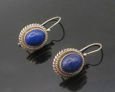 "BALI 925 Sterling Silver - Vintage Cabochon Lapis Lazuli Drop Earrings - EG8805  BALI 925 Sterling Silver - Vintage Cabochon Lapis Lazuli Drop Earrings - EG8805  Jewelry Type:         Earrings   Metal Type:            925 Silver   Metal Size:             1\"  Stone Type:            Lapis Lazuli   Condition:              N/A  Jewelry Weight:     6.6 Grams  PLEASE NOTE: THIS ITEM IS PRE-OWNED. ALTHOUGH MOST ITEMS ARE IN VERY GOOD CONDITION, SOME MAY NEED CLEANING AND/OR MINOR REPAIRS. WE MAKE A VERY STRONG EFFORT TO UPLOAD CLEAR PICTURES. PLEASE INSPECT ALL PICTURES AND ASK ALL QUESTIONS YOU MAY HAVE PRIOR TO MAKING A PURCHASE. NOT ALL STONES ARE GENUINE, SOME ARE ENHANCED OR CREATED." Earrings Metal, Lapis Lazuli, Types Of Metal, Metallic Silver, Sell On Etsy, Bali, 925 Silver, Gold Bracelet, Jewelry Earrings