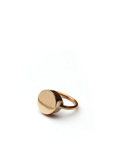 Our take on the classic signet ring, this minimal cast brass ring is an easy wardrobe staple. Available in whole sizes 5-9. Not sure of your ring size? Click here. Our work is made to order, and as such turnaround can take two to three weeks from order placement to shipping. Need it sooner? Please email us prior to pla Gold Brass Signet Ring For Everyday, Everyday Brass Signet Ring, Timeless Everyday Brass Rings, Everyday Timeless Brass Rings, Classic Brass Signet Ring For Promise, Classic Everyday Brass Signet Ring, Classic Brass Signet Promise Ring, Minimalist Brass Ring Jewelry, Everyday Brass Open Ring