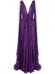 amaranth purple silk blend chiffon bead embellishment sequin embellishment plunging V-neck concealed rear zip fastening scoop back sleeveless fitted waistline elongated back panels floor-length silk lining Grammy Dresses, Gown Purple, Cold Shoulder Gown, Evening Dress Beaded, Bead Embellishment, Beaded Chiffon, Beaded Gown, Silk Gown, Amaranth