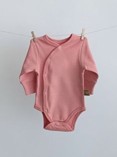 Long Sleeve Onesie For Loungewear, Soft Long Sleeve Onesie For Loungewear, Spring Long Sleeve Bodysuit, Spring Solid Long Sleeve Bodysuit, Spring Long Sleeve Solid Bodysuit, Fitted Long Sleeve Onesie For Spring, Fall Cotton Long Sleeve Bodysuit, Fitted Long Sleeve Onesie For Fall, Winter Long Sleeve Cotton Bodysuit