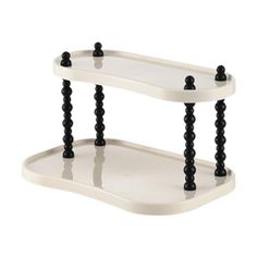 two tiered trays with black beads on each side and one shelf is white