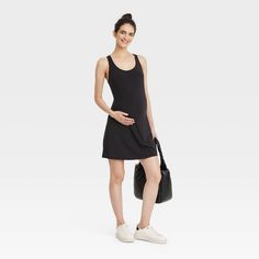 Sport cool, comfy style during baby showers or running errands wearing this Sleeveless Midi Active Dress from Isabel Maternity By Ingrid & Isabel™. This sleeveless active dress is tailored in a midi length to give you a stylish look, and it features built-in shorts for extra coverage. The soft, stretchy jersey fabric offers cool comfort, while the V-neckline with a racerback gives you a flattering fit. Complete the look with your choice of footwear. Sporty Sleeveless Lounge Dresses, Sporty Sleeveless Loungewear Dresses, Black Sleeveless Dress For Everyday, Casual Stretch Cotton Sleeveless Dress, Black Sleeveless Everyday Dress, Stretch Bump Friendly Sleeveless Dress, Bump Friendly Sleeveless Tank Top, Summer Sleeveless Nursing-friendly Dress, Summer Sleeveless Nursing Friendly Dresses