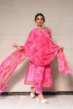 Prepare to get overwhelmed with a swirl of compliments by dressing yourself in this beautiful Printed chiffon kurta suit set. With chiffon floral print dupatta and straight silhouette, Pair it with beautiful statement earrings and traditional juttis. SKU#: 11403216PK Disclaimer: There may be slight difference in actual product color compared to product images. Pink Georgette Palazzo Set With Sheer Dupatta, Elegant Georgette Sharara With Printed Motifs, Elegant Floral Print Georgette Sharara, Summer Georgette Sets With Sheer Dupatta, Unstitched Suit With Resham Embroidery In Georgette, Summer Sets With Sheer Dupatta In Georgette, Summer Pink Palazzo Set With Sheer Dupatta, Floral Print Chiffon Sets, Festive Pink Unstitched Suit With Floral Print