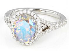 Bella Luce® aurora borealis and white diamond simulants 6.26ctw oval and round, rhodium over sterling silver ring. Measures approximately 0.81" L x 0.5" W and is not sizable. Diamond equivalent weight is 3.79ctw. Elegant Iridescent Rings With Accent Stones, Iridescent Oval Jewelry For Anniversary, Iridescent Oval Jewelry For Anniversaries, Elegant Iridescent Oval Jewelry, Iridescent Fine Jewelry For Anniversary, Iridescent Rings With Accent Stones For Formal Occasions, Formal Iridescent Rings With Accent Stones, Iridescent Rings With Accent Stones For Formal Events, Formal Iridescent Oval Ring