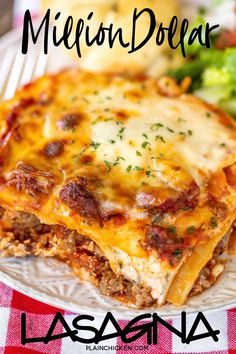 lasagna casserole with meat and cheese on a plate next to a salad