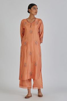 Peach three fourth sleeves A-line silk kurta with floweret resham embroideries details. Paired with a wide legged lace hem palazzo. - Aza Fashions Elegant Summer Sets With 3/4 Sleeve, Silk Palazzo Set With Straight Kurta For Spring, Spring Silk Palazzo Set With Straight Kurta, Elegant Orange Silk Sets, Elegant Cotton Silk Kurta For Spring, Elegant Raw Silk Traditional Wear For Spring, Spring Raw Silk Palazzo Set With Straight Kurta, Raw Silk Palazzo Set With Straight Kurta For Spring, Spring Palazzo Set In Raw Silk With Straight Kurta