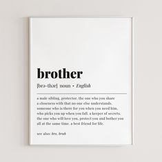 a white framed poster with the words brother in black on it's front and back