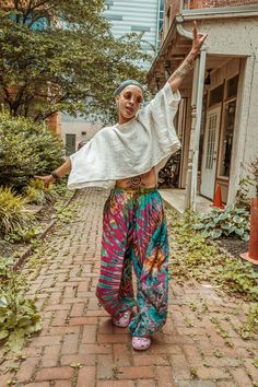 The hippie tie dye flowy pants you've been searching for! These pants are ultra flowy, flattering and beautiful! Available in several beautiful colors each is one of a kind, unique and completely hand tied and dyed, so each pattern will be unique and one of a kind.  Regular fits waists 24"-44" (XS-XL) PLUS fits waists 42"-60" (2X-4/5X) Super flowy bohemian style fits perfect for yoga, your next festival or grocery store runs! Tie Dye Yoga Pants, Hippie Yoga Outfits, Homemade Hippie Costume Diy, Hippy Pants Outfit, 60s Fashion Hippie Woodstock, Buddhist Fashion, Bohemian Outfits Women, Tie Dye Pants Outfit, Modern Hippie Aesthetic