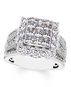 a white gold ring with square cut diamonds