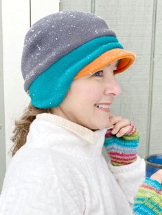 "OMG!!!! Never knew a hat that would fit perfect, is very comfortable, soft, and keeps my ear warm too...all in one, wow!" - Gail, TX Women's Fleece Beanie Hat A NEW Trio of Colors Hat! This anti-pill fleece newsboy hat is designed with function, style and you in mind. Need more color in your life? Yes! Triple your fun in the new fleece hat color combo in a pre-selected trio of yummy fleece colors! Whether you're shoveling the driveway or tackling the big grocery day on a blustery winter day - d Fleece Lined Beanie Hat, One Size Fits Most, Fleece-lined Beanie Hat, One Size Fits Most, Fleece-lined Beanie Hat, One Size, Beanie With Fleece Lining, One Size Fits Most, One Size Beanie With Fleece Lining, Winter Reversible Hats For Outdoor, Reversible Winter Hats For Outdoor, Winter Outdoor Reversible Hats, Beanie Earflap