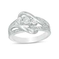 Complement any outfit with this shimmering fashion ring. Crafted in sterling silver, this graceful style features a trio of diamond accents - each artfully set to enhance size and sparkle - along the center of the design on the diagonal. Along the diamond-accented and beaded wide-split shank, polished ribbons layer over and bypass the centerpiece. Buffed to a brilliant luster, this look is certain to please. Custom-made to fit her ring size. Sterling silver rings cannot be resized after purchase Graceful Style, Her Ring, Bypass Ring, Peoples Jewellers, Silver Prices, Split Shank, Fashion Ring, Diamond Stone, Diamond Clarity