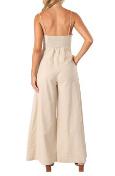 A modern squared neckline tops this sunshine-ready jumpsuit popped with flowy wide legs and made from a lightweight blend of cotton and linen. Hidden side-zip closure Square neck Adjustable straps Side-seam pockets Partially lined 70% cotton, 30% linen Hand wash, dry flat Imported Beige Linen Summer Jumpsuits And Rompers, Beige Relaxed Fit Jumpsuits And Rompers For Summer, Cotton Wide-leg Jumpsuits And Rompers For Loungewear, Cotton Wide Leg Jumpsuits And Rompers For Loungewear, Summer Wide-leg Relaxed Fit Jumpsuits And Rompers, Summer Wide Leg Jumpsuits And Rompers With Relaxed Fit, Neutral Summer Casual Jumpsuits And Rompers, Neutral Casual Jumpsuits And Rompers For Summer, Relaxed Fit Wide Leg Jumpsuit For Day Out