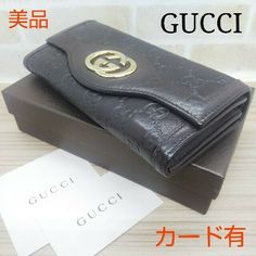 Auth Gucci Fold Purse #1412 InterRocking Long Wallet  GG Black Leather Italy Description Condition: B (Good Condition But Signs of Small Scratches and / or Stains) General: Signs of Wear, Scratches COIN PURSE / WALLET X 2, Card Holder x 12, COIN PURSE X 2 / Accessories: Shop Card Color Black Size (Approx): W 19cm H 10cm D 3cm Size (Approx): W 7.49inch H 3.94 Inch D 1.19inch Condition: B  N : (New)  S : (Almost brand new)  A : (Great condition Light signs of use with tiny scratches and/or stains) Gucci Brown Formal Wallet, Formal Brown Gucci Wallet, Gucci Bifold Wallet With Original Box, Gucci Brown Wallet With Card Slots, Gucci Bifold Wallet For Formal Occasions, Luxury Brown Gucci Wallet, Gucci Designer Wallet For Formal Occasions, Coin Purse Wallet, Lighted Signs