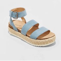 Brand New Light Blue Platform Sandals With Ankle Strap, Light Blue Ankle Strap Sandals With Platform, Blue Flat Platform Sandals, Light Blue Flat Heel Sandals For Summer, Light Blue Round Toe Sandals For Summer, Light Blue Platform Sandals With Synthetic Material, Light Blue Platform Sandals For Spring, Light Blue Flat Sandals For Summer, Spring Light Blue Platform Sandals