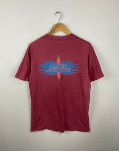 *ITEM: Vintage Nava Surf Surfboard surf Large  surboarding 1990s  nava Tshirt Maroon  Size L               *ITEM DETAILS: 👇🏻 Please be aware that all vintage items will usually show a few signs of wear or fading due to age, but anything visible such as stains or holes, and serious flaws have been photographed.For any further information on this item please contact us and we will be happy to help. *SIZE: LARGE  * ACTUAL SIZE MEASUREMENT: 👇🏻 *PIT TO PIT(WIDTH):21.5"INCHES *LENGTH(FROM SHOULDER): 26.5"INCHES    *ALL MEASUREMENTS ARE TAKEN WITH THE GARMENT FLAT ON THE GROUND *VIEW FULL SHOP HERE: *SHIPPING: (WITH ONLINE TRACKING NUMBER ) *DHL EXPRESS SHIPPING:4-6 BUSINESS DAYS *Don't Worry About Customs Tax or Fees. I usually Declare As 'Gifts' And Low Value  *PAYMENT (ACCEPT "PAYPAL" ONLY 90s Graphic Print Surfing Tops, 90s Graphic Print Tops For Surfing, Mens T Shirts, Mens Graphic Tee, Dhl Express, Surfboard, No Worries, Favorite Outfit, Surfing