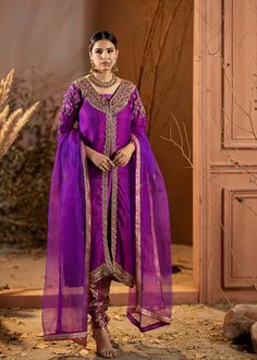 Introducing our stunning Purple Organza Outfit! This elegant dress is adorned with intricate details, featuring beautiful embroidery and embellishments. The rich purple color adds a regal touch, and it comes with a chooridar pajama for a complete look. Perfect for making a statement at special occasions! Elegant Semi-stitched Purple Sets, Elegant Purple Sets With Intricate Embroidery, Elegant Purple Salwar Kameez With Zari Work, Elegant Purple Set With Zari Work, Elegant Purple Sets For Diwali, Elegant Purple Sets With Zari Work, Designer Embroidered Purple Salwar Kameez, Elegant Purple Salwar Kameez For Eid, Designer Purple Unstitched Suit With Resham Embroidery