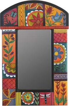 a colorful mirror with an artistic design on it's face and bottom half is shown