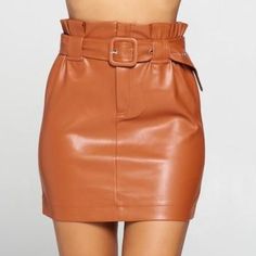 Brown Faux Leather Skirt Never Worn. Nwot Chic Brown Leather Mini Skirt, Brown Belted Fitted Mini Skirt, Brown Fitted Belted Mini Skirt, Fitted Brown Belted Mini Skirt, Fall Faux Leather Brown Mini Skirt, Fitted Brown Mini Skirt With Belt Loops, Fall Belted Mini Skirt, Belted Brown Skirt, Brown Faux Leather Mini Skirt For Fall