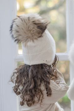 Stay warm in style with our luxurious Cashmere Aviator Hat. Crafted from the softest cashmere, this best-selling hat features a large pom and keeps you toasty while adding a touch of cuteness to any outfit. Experience ultimate comfort and warmth in our cashmere aviator hat for boys and girls. 100% mink cashmere. Unlined. Comes in four cute colors - Oatmeal, Pink, Ivory, and Grey. Cashmere Knit aviator-style winter hat with ear coverage. Super soft and stretchy. Detachable large natural Raccoon P Hat For Boys, Aviator Hat, Baby Boy Hats, Pink Ivory, Boy Hat, Style Winter, Aviator Style, Ear Hats