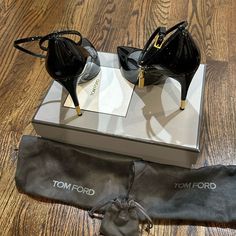 Tom Ford Size 36.5 Patent Leather Ankle Wrap Straps With Gold Lock And Key Signature Tf Detail. Worn Once Like New, Has Sole Protectors So If You Remove Them The Sole Will Look Brand New. Comes With Box Two Dust Bags And Heel Replacements. Amazing Heels!! Luxury Ankle Strap Court Shoes For Formal Occasions, Luxury Formal Court Shoes With Ankle Strap, Luxury Ankle Strap Court Shoes For Office, Luxury Evening Court Shoes With Heel Strap, Elegant Black Heels With Heel Tab, Chic Heels With Heel Tab And Ankle Strap, Chic Heels With Ankle Strap And Heel Tab, Luxury Ankle Strap Court Shoes For Evening, Designer Evening Court Shoes With 4-inch Heel