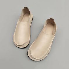 Beige Slip-on Flats, Beige Slip-on Flats With Flat Bottom, Leather Slip-ons With Textured Sole, Beige Leather Slip-on Shoes With Leather Footbed, Chic Beige Almond Toe Slip-ons, Beige Flat Bottom Slip-ons, Slip-on Flats With Contrast Sole, Beige Slip-on Flats With Rubber Sole, Beige Slip-on Flat Leather Shoes