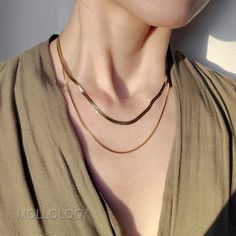 "Minimalist & Chic double layer necklace, great for everyday essential! Gold Necklace Set, Gold Herringbone Necklace, Double Layer Necklace, Minimalist Necklace, Water and Tarnish Resistant Necklace, Gift for Her, Box Chain Necklace, Double Necklace, Multi Strain Necklace, Gold Chain Set PRODUCT DETAILS: * Length - 15\"L Herringbone Chain (3mm thickness) | 17\"L Box Chain (1mm thickness) + 2\" extension * This is a ONE-pieced layered necklace (NOT 2 separate necklaces!) * 18K Gold Finish over Su Gold Herringbone Necklace, Tiny Cross Necklace, Necklace Set Gold, Starburst Necklace, Double Necklace, Double Layer Necklace, Herringbone Chain, Herringbone Necklace, Sunglass Chain