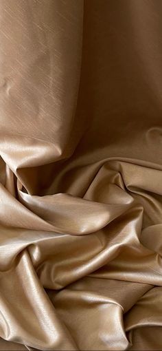 a close up view of a tan fabric