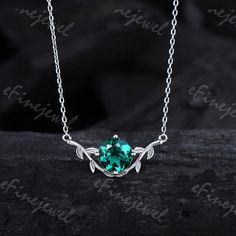 8mm round lab emerald pendant necklace leaf vine green crystal necklace May birthstone dainty handmade proposal gifts for women gift for mom Product Specifications: 8mm round lab emerald  Chain: 16-18 Inches.  Metal: silver, 14K Or 18K Soild Gold (White, Yellow, Rose)   -See more Engagement rings -You can click on the link www.etsy.com/shop/eFinejewel?section_id=24546904 Ring Size: We can make the ring in any ring size,If the ring size is not in the list,contact us,we'll custom make it for you! Emerald Chain, Green Crystal Necklace, Emerald Pendant Necklace, Necklace Leaf, Emerald Necklace Pendant, Emerald Pendant, May Birthstone, Green Gems, Proposal Gifts