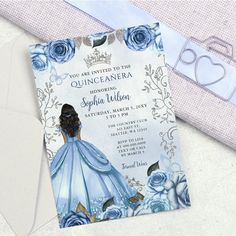 a princess themed birthday party with blue flowers and roses on the front, along with a card that says you are going to the quinceaner