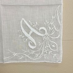 I have 3 available - select quantity while purchasing.  Price is for EACH hankie.   A beautiful vintage white hankie with a large monogrammed "A" with decorative flowers.  This hankie is in near perfect condition! I have found little to no signs of use.  Perfect for a wedding...something old.  Also great for a general gift, collection or just because :)   Measures about 16 inches square I have freshly washed and pressed/ironed this hankie as well.  Will come nicely packaged for safe mailing and Classic Monogram Handkerchiefs For Wedding Gift, Elegant White Handkerchiefs With Initials, Elegant Embroidered Handkerchiefs For Wedding Gift, Wedding Something Old, Handkerchief Monogram, Classic White Embroidered Handkerchiefs, Vintage Cream Embroidered Handkerchiefs, Ladies Handkerchiefs, Decorative Flowers