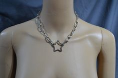 Welcome to my shop! UK Free Shipping A hand made super quality silver tone Heart or Star necklace A piece to wear with pride  Super cute grungy aesthetic jewellery, looks gorgeous with any outfit necklace lengths available in 12, 14, 16, 18, 20, and 22 inches, . If you need any custom size feel free to message us and we can work something out and adjust the price accordingly to length. heart or star pendant width approx. 3 cm   necklace chain width approx. 11 mm - a chrome plated steel chain, cl Star-shaped Metal Clavicle Chain Necklace, Metal Star-shaped Clavicle Chain Necklace, Star-shaped Metal Clavicle Necklace, Metal Star-shaped Clavicle Necklace, Silver Star-shaped Choker For Party, Trendy Silver Heart-shaped Choker, Silver Star-shaped Charm Necklaces For Party, Silver Star Charm Necklaces For Party, Silver Star-shaped Metal Necklace