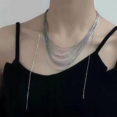 ✦ Transform your wardrobe with this Multistrand Silver Tassel Chain Necklace. Accessorize with this elegant yet simple piece for a bold and daring look. Perfect for a night out, this necklace will take your outfit to the next level. Despite the absence of diamonds, this eye-catching piece will make you shine at any party! ----------- DETAILS ----------- - Color: Silver - Materials: Brass - Necklace Length: 42.3cm - SKU: HN2699 Minimalist Silver Chain Necklace For Party, Modern Choker With Adjustable Chain For Parties, Modern Party Choker With Adjustable Chain, Metal Clavicle Chain Drop Necklace For Party, Elegant Silver Chain Necklace For Party, Trendy Silver Chain Necklace For Formal Occasions, Trendy Silver Choker For Formal Occasions, Modern Adjustable Chain Choker For Parties, Elegant Metal Layered Necklace For Party