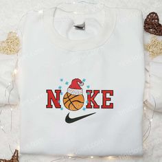 The Basketball x Nike Christmas Embroidered Sweatshirt is the perfect combination of style and comfort. Made from high-quality materials, this sweatshirt features a festive embroidered design that showcases your love for basketball and the holiday season. The sweatshirt is designed to keep you warm and cozy, making it ideal for chilly winter days. With its unique Christmas-themed embroidery, this sweatshirt is a standout piece that will make you the center of attention at any holiday gathering. Nike Christmas, Maroon Hoodie, Embroidered Shirts, Cartoon Christmas, Cartoon Shirts, Cartoon Sweatshirts, Merry Christmas Shirts, Best Gift Ideas, Hoodie Material