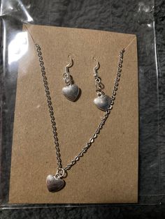 Each set comes with a pair of earrings and a silver curb chain necklace. It is super lightweight and suitable to wear whenever and wherever Casual Silver Heart Necklace, Silver Heart-shaped Metal Jewelry Sets, Casual Silver Heart-shaped Jewelry, Casual Metal Jewelry For Valentine's Day, Casual Silver Jewelry For Valentine's Day, Casual Silver Dangle Jewelry, Curb Chain Necklace, Curb Chain, Silver Heart