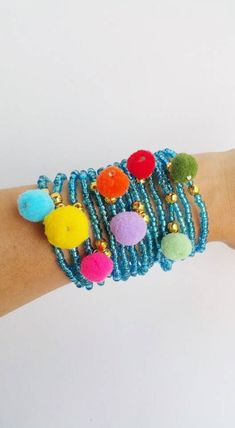 pom pom bracelet, boho bracelet, Stackable Bracelet, blue jewelry, poms boho jewelry, stretching bracelets, friendship, friend, blue set Women stretch bracelets, set of 15. Each bracelet is 7,5 inches TAKE ADVANTAGE OF COMBINED SHIPPING Only 0.50€ (about 0.60 USD) for adicional item!! Handmade with love :) Playful Blue Friendship Bracelets With Colorful Beads, Handmade Blue Stretch Bracelet For Festivals, Handmade Blue Friendship Bracelets Playful Style, Blue Handmade Friendship Bracelets Playful Style, Handmade Playful Blue Friendship Bracelets, Handmade Blue Playful Friendship Bracelets, Festival Stretch Bracelet With Colorful Beads In Blue, Blue Stretch Bracelet With Colorful Beads For Festival, Playful Blue Friendship Bracelets With Round Beads