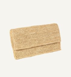 A summer and resort favorite, The Zoe Report named our Edgartown Clutch a must have bag and we don't go on vacation without it. It looks just as chic dressed up with a cotton dress as it does with a casual linen shirt and wide leg linen pants. Classic raffia envelope clutch with an inside open pocket and cotton lining, snap closure. 13" by 7.5" by 1". Raffia. Made in Madagascar. Casual Linen Bags For Summer, Summer Travel Bag Made Of Linen, Versatile Rectangular Summer Straw Bag, Versatile Rectangular Straw Bag For Summer, Chic Natural Straw Bag For Summer, Chic Natural Color Straw Bag For Summer, Versatile Beige Straw Bag For Summer, Versatile Natural Straw Bag For Vacation, Natural Linen Beach Bag