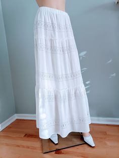 "Unique, bohemian style bridal skirt.    Boho style bridal skirt, made of white rayon with embroidered lace and 100% cotton lining. The skirt has 3 layers with an elastic waistband and cotton lining.  Material: Rayon, Cotton Available in sizes: S: 4-6, Waist:  25.5\"-26.5\", Hip: 36-37\" M: 8-10, Waist:  28\"-29\", Hip: 38-41\" Length: 38\"- 41\" The skirts are very versatile and comfortable and can be worn on the waist or low on the hips depending on personal taste." Tiered Ruffle Maxi Skirt For Brunch, Brunch Tiered Maxi Skirt With Ruffles, Brunch Tiered Ruffle Maxi Skirt, Flowy Tiered Maxi Skirt For Brunch, Tiered Lined Maxi Skirt For Brunch, Lined Tiered Maxi Skirt For Brunch, Maxi Length Ruffled Skirt For Vacation, Maxi Skirt With Ruffles For Vacation, Elegant Tiered Maxi Skirt