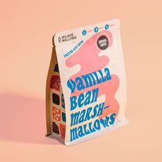 a package of vanilla bear marshmallows sitting on top of a pink background