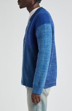 Hand-knit using surplus and scrap yarns, this cardigan crafted with soft wool features tonal colorblocking and a true one-of-a-kind look. Front button closure Ribbed cuffs and hem Blue cardigan is 73% wool, 17% viscose, 7% nylon, 3% cashmere; white cardigan is 54% wool, 20% viscose, 8% nylon, 6% acrylic, 4% polyester, 3% cashmere, 3% linen, 2% mohair Hand wash, dry flat Imported Designer Clothing Due to the handmade nature and the use of different combinations of leftover yarns, each truly one-a Yarn Project, Blue Cardigan, Yarn Projects, White Cardigan, Soft Wool, Handmade Natural, Hand Knitting, Color Blocking, Wool Blend