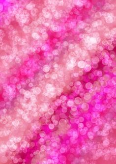 an abstract pink background with lots of small circles