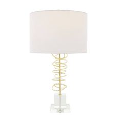 a table lamp with a white shade on the top and gold spirals around it