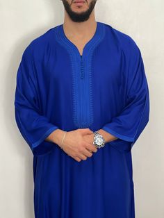 *Mens Moroccan Thobe - ROYAL BLUE djellaba, Jubbah, Beautiful quality with a lovely soft feel and texture. Brand new, with original personal wrapping. We are known to many for our extensive Moroccan clothing collection. *Mens Moroccan Thobe -Royal Blue djellaba, Jubbah, is your best bet for a relaxed but stylish look! Quality material that will last you a lifetime.  *Update your wardrobe and get some traditional looks in! *Extremely beautiful quality brand new *Colours : ROYAL BLUE *material : c Blue Long Sleeve Thobe For Eid, Traditional Blue Thobe For Eid, Blue Traditional Long Thobe, Traditional Blue Long Thobe, Blue Long Sleeve Thobe With Dabka Details, Traditional Long Blue Thobe, Blue Long Sleeve Thobe With Dabka, Traditional Blue Abaya With Dabka, Traditional Royal Blue Long Sleeve Kaftan