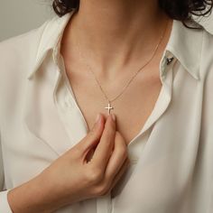 Showcase your faith with our Cross Pendant Necklace. The perfect gift for confirmation, christening, or any special occasion. Made for women who want to make a statement of their belief in a stylish and elegant way. Get one for yourself or a loved one today! Pendant width: 10 Millimeters; Pendant height: 16 Millimeters Please note that we also offer matching Cross Bracelet in our shop! Elegant Sterling Silver Cross Necklace As Gift, Elegant Clavicle Chain Cross Necklace For Gift, Delicate Cross Jewelry Gift, Elegant Rose Gold Sterling Silver Cross Necklace, Elegant White Crucifix Necklace, Elegant Cross Necklace With Delicate Chain, Elegant Personalized Cross Pendant Jewelry, Rose Gold Cross Jewelry For Mother's Day, Minimalist Rose Gold Cross Pendant Jewelry