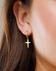 Meet our lovely cross hoops! Classic and minimal, perfect for any occasion and for your everyday wear since they are so dainty and timeless. Stack it with our other hoops and studs to create your own personal and unique look!  DETAILS * Material : 18K Gold on Brass / Sterling Silver. * Special anti-tarnish protective coating. * Handcrafted with love in our studio. * Comfortable and lightweight.  * Hoop Inner Diameter : 9mm * Cross Size : 10mm * Sold in pairs.   PACKAGING & GIFTS We will package your order in a beautiful gift box :) * You can also gift the jewelry straight to your loved one!  * If you are purchasing multiple items, we will package them together in the same box.  * If you need separate boxes, please leave us a note at checkout. Thank you for visiting our shop! If you have qu Minimalist Cross Pendant Earrings, Minimalist Hypoallergenic Cross Earrings, Cross-shaped Huggie Earrings For Gift, Dangle Cross Earrings, Packaging Gifts, Earrings Cross, Necklace Clasps, Gold Filled Earrings, Cross Bracelet